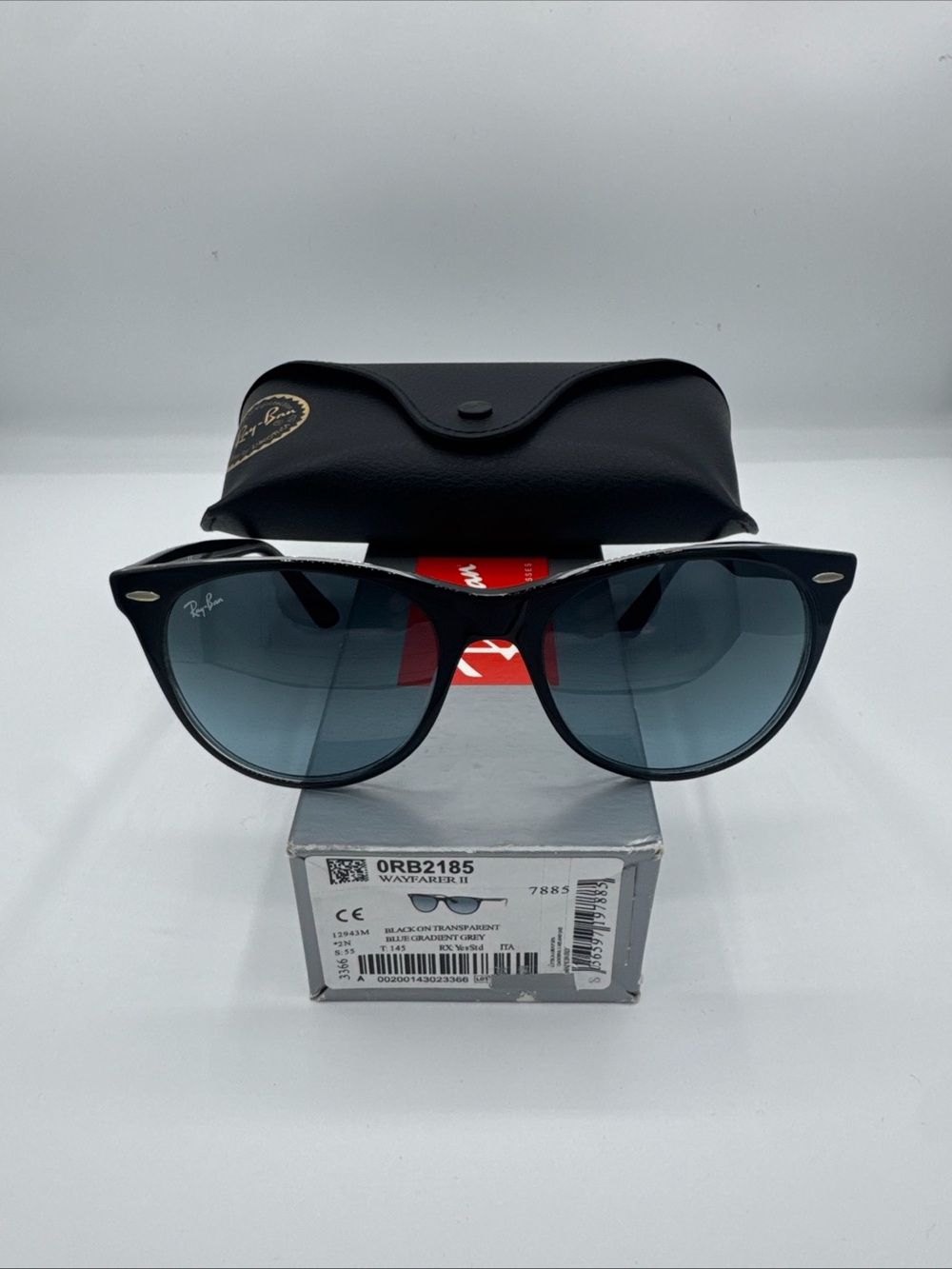 Ray Ban RB2185 Ref# 7885 - Black on Transparent frame with Blue gray lense